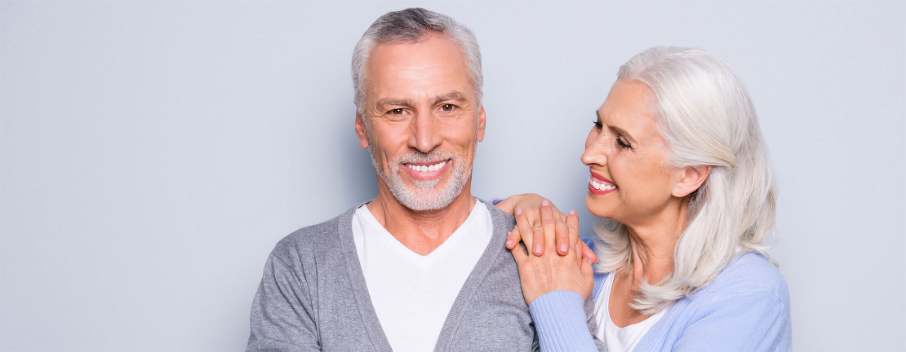 Couple with dental implants